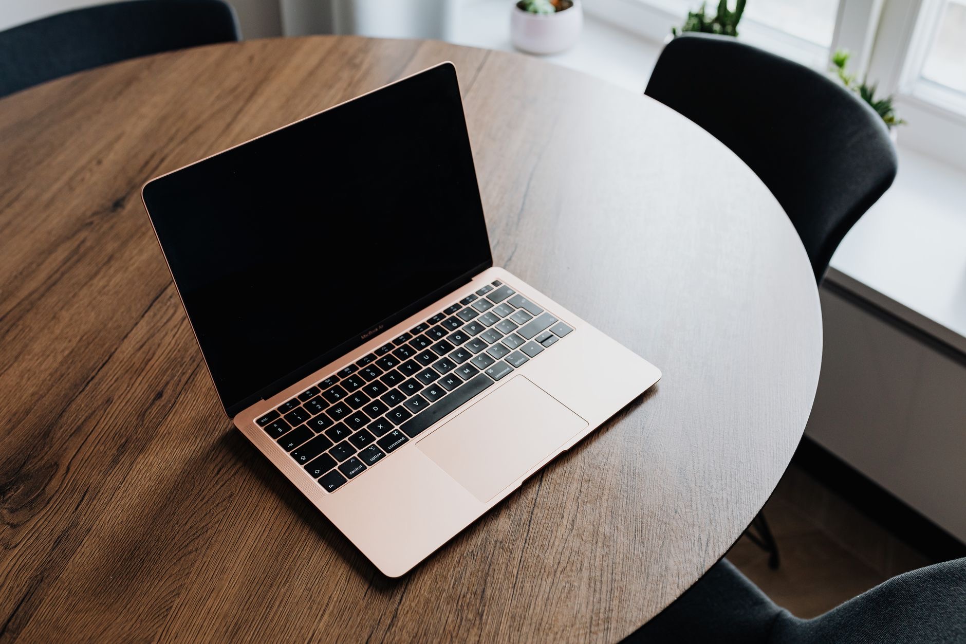 MacBook on a desk ready to use