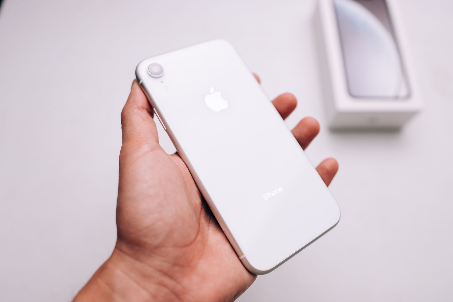 Person setting up a new iPhone